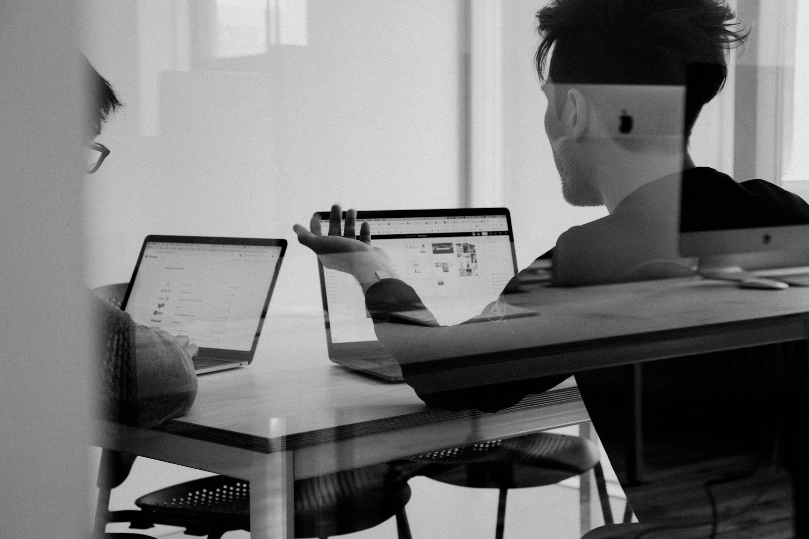 Business analysts reviewing requirements and delivery evidence